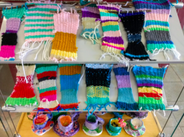 ﻿3rd Grade tapestries and 2nd Grade teacups with saucers, representing the vivid nature of the Portola.